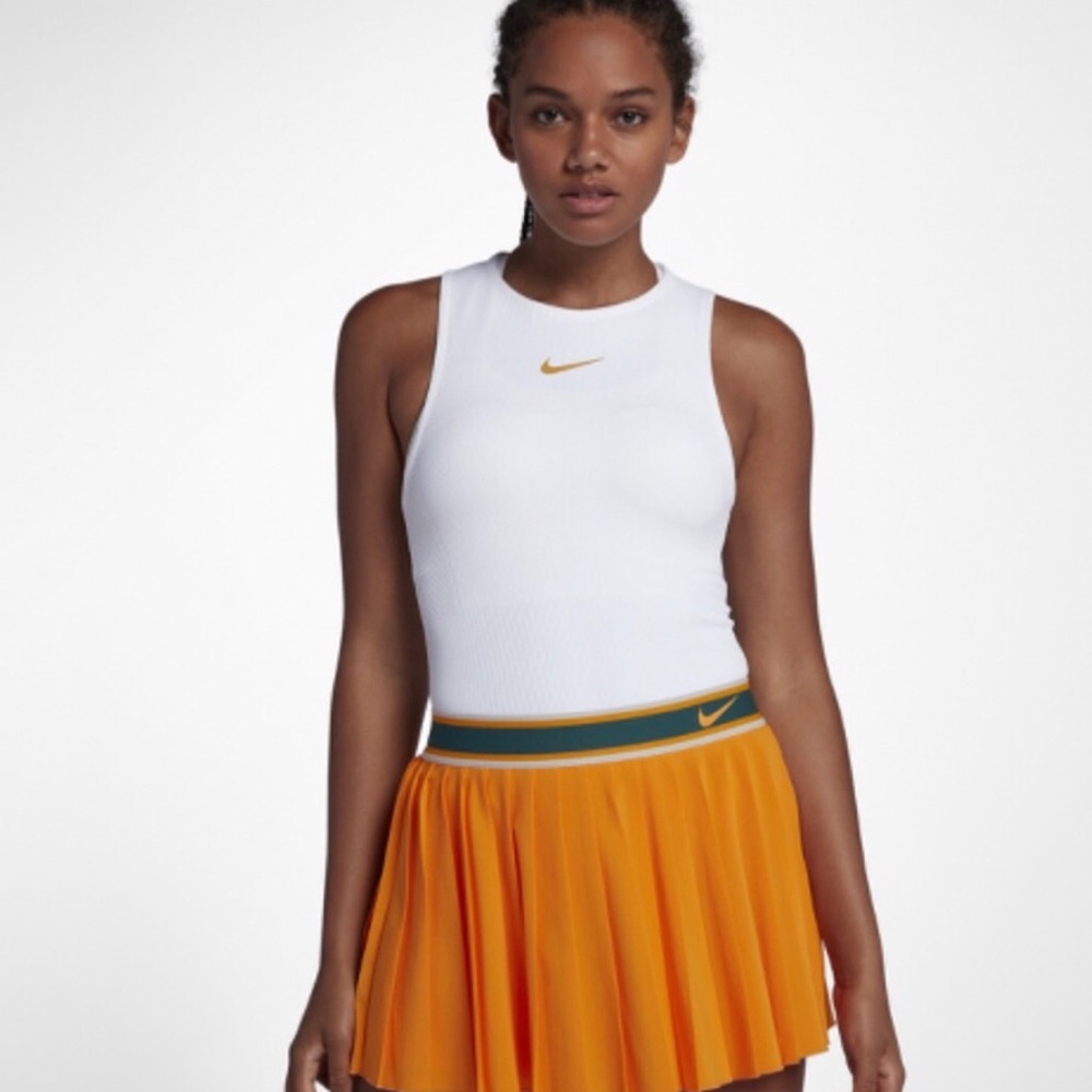 Brand new with tags NIKEcourt slam top size small